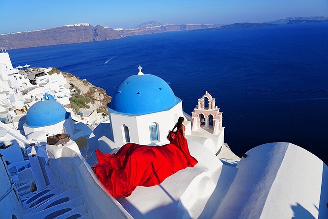 1-Hour Flying Dress Photoshoot, Instagram spots - Stop 2: Firostefani blue domes for the postcard finish