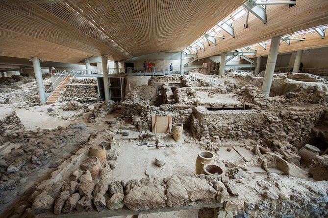Archaeological Bus Tour To Akrotiri Excavations & Red Beach - Akrotiri Excavations: walking through a volcanic time capsule