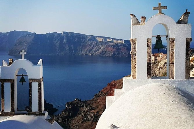 Aroma of Santorini:Private Half Day Sightseeing with wine tasting - Oia’s Main Street Walk: Cave Houses and the Blue-Domed Agios Theodori