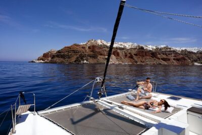 Caldera Cruise with Swim Stops, BBQ on board and drinks! - Pickup, Modern Catamaran Comfort, and What’s Included