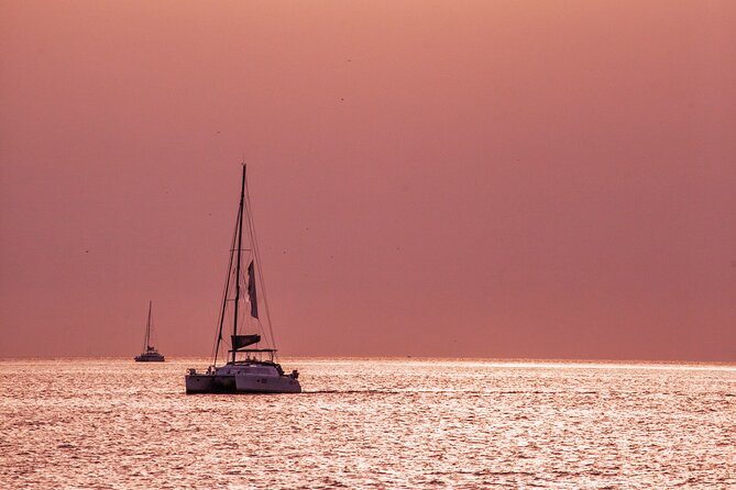 Deluxe Santorini Sailing with BBQ and Drinks Shared Tour - The Catamaran Experience: Comfort, Views, and Crew Energy