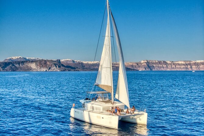 Deluxe Santorini Sailing with BBQ and Drinks Shared Tour - Red Beach Stop: Classic Color and a Quick Swim Window