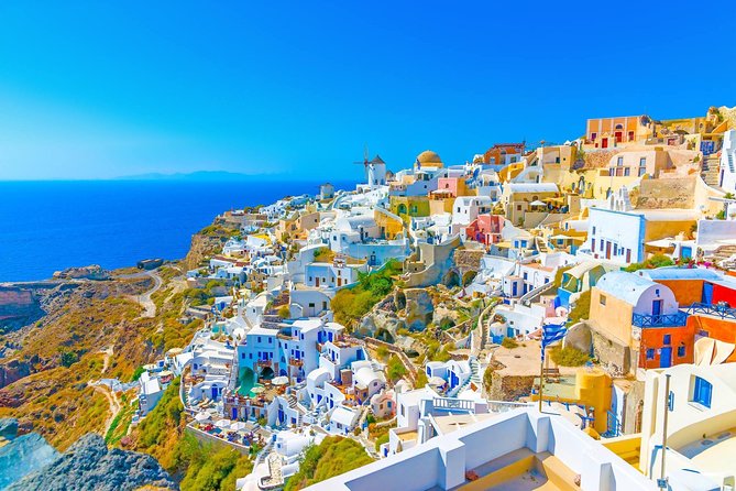 Discover Santorini Private Tour - Kamari black beach in 30 minutes: swim, snack, and reset