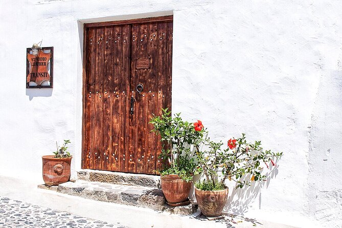 Discover the Cultural Heart of Santorini with Mεliton Tours - Stop 1: Pyrgos for old Santorini and castle views