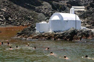 Early Season Experience: 3-hours Santorini Volcano and Hot Springs Trip - Stop 1: Nea Kameni crater hike, with an optional 2.50 euro entrance fee