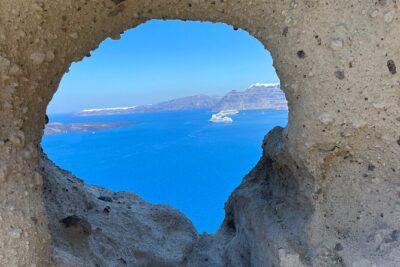 Exclusive Shore Excursion : Scenic Santorini, Shopping & Winery - Entering Oia: Cliffs, Cave Houses, and Photo-Friendly Walking Time