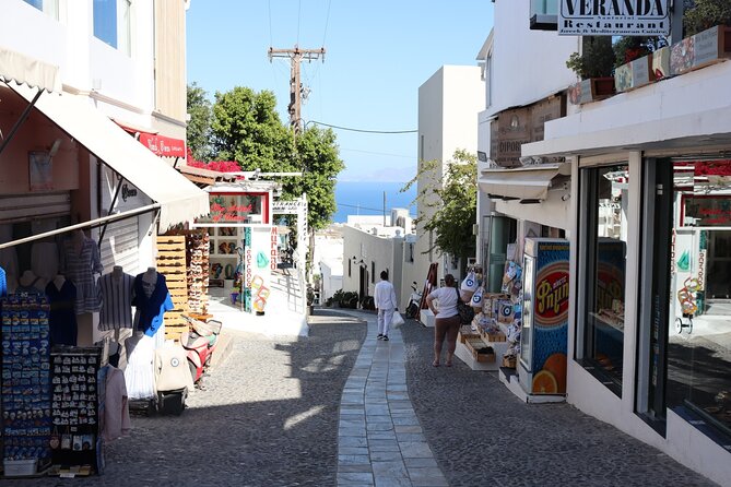 Fira Walking Tour: Explore Top Sights & Hidden Gems - Stop 3: Holy Cathedral of Saint John the Baptist (Town-Center Contrast)