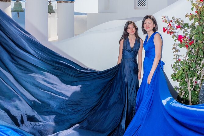 Flying Dress Experience -Private Santorini Photoshoot - Backgrounds that matter: sunset glow and sea vistas