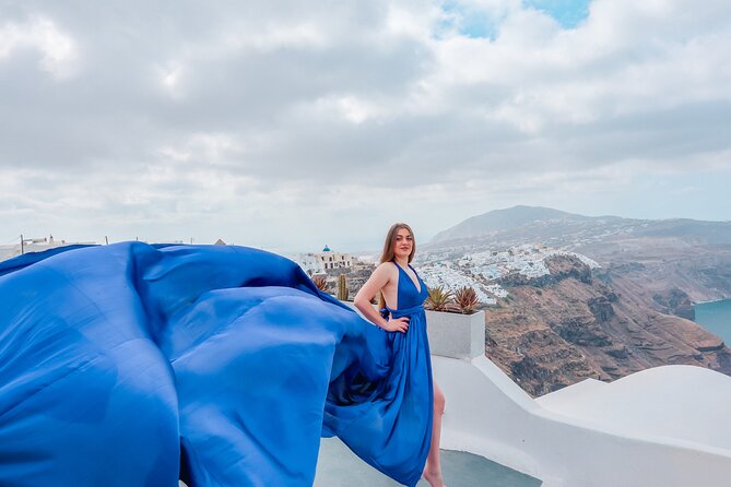 Flying Dress Photoshoot Experience in Santorini with pick up - Santorini flying-dress magic: why this works here