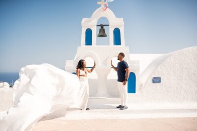 Flying Dress Santorini Photoshoot - Oia’s photo walk: from marble streets toward Blue Domes views