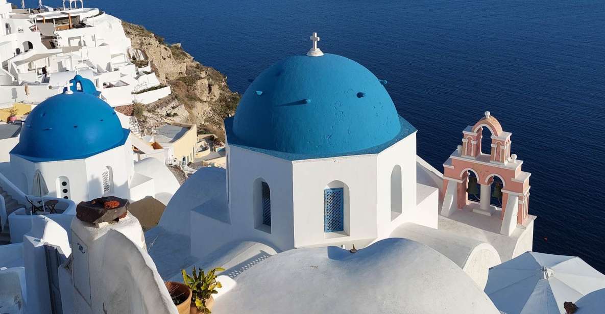 From Santorini: Guided Oia Morning Tour with Breakfast - The Three bells of Fira stop: quick, famous, and camera-friendly