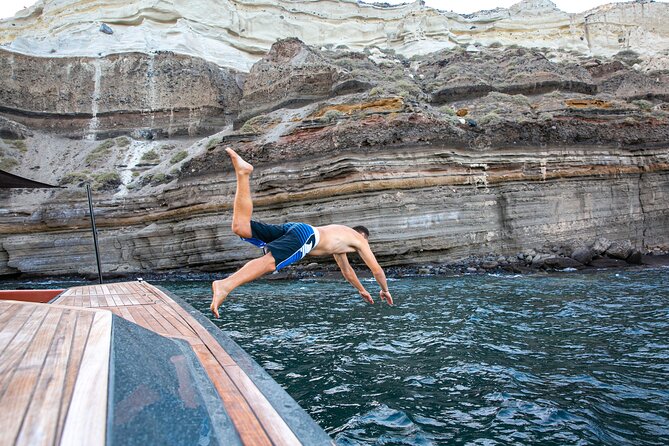 Luxury Private Power Catamaran Tour in Santorini - Sunset cruise option: when timing changes the whole mood