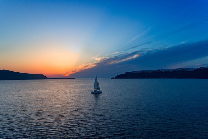 Luxury Sunset Cruise with Swim Stops, BBQ meals and Open Bar - Santorini Volcano Area: Hot Springs and the Caldera Route