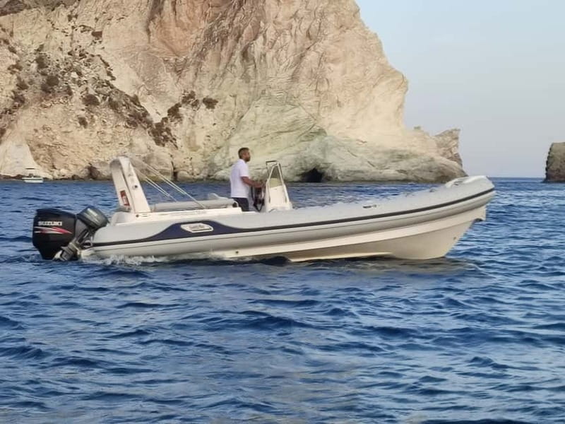 Private, fully customizable cruise in Santorini's caldera - Language and Onboard Guidance That Keeps It Relaxed