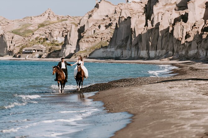Private Horse Riding Experience in Santorini - Eros Beach at the end of the trail: black sand, lava stones, and sea time