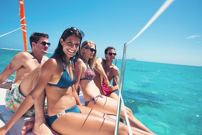 Private Luxury Santorini Catamaran Cruise with Port Pickup - Red Beach swim stop: red volcanic sand, a quick splash, and what to expect