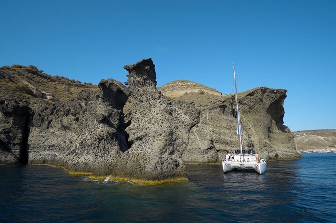 Private Luxury Santorini Catamaran Cruise with Port Pickup - Palea Kameni hot springs: warm water in the volcanic crater area