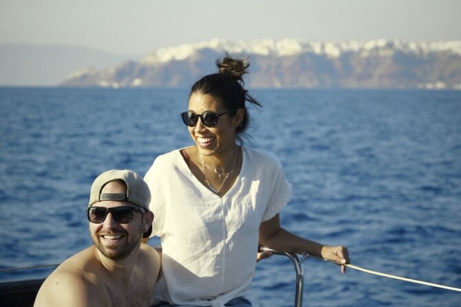Private Luxury Santorini Catamaran Cruise with Port Pickup - Nea Kameni meal at anchor: where the lunch or dinner meets the caldera views