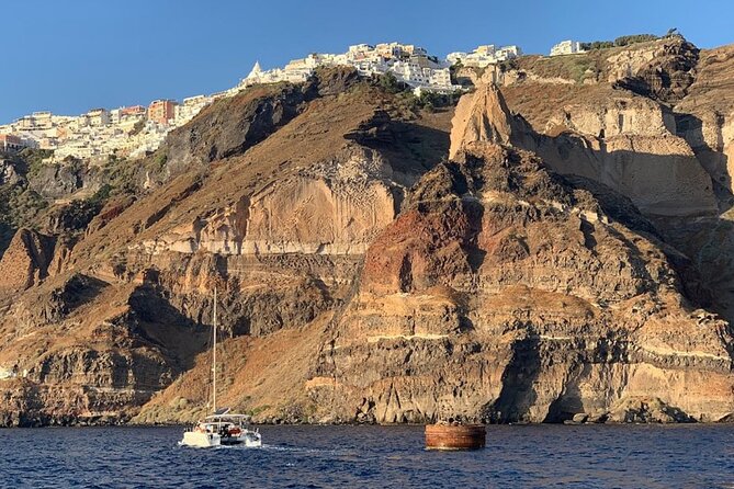 Private Luxury Santorini Catamaran Cruise with Port Pickup - Drinks on deck: unlimited soda and wine/beer with a safety limit