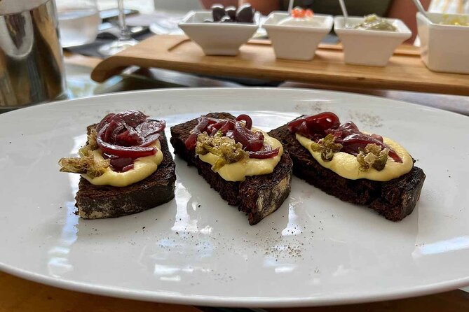 Private Santorini Wine Tour with 12 Wine Tastings and Dinner - Wine, Food, and the Weather Factor
