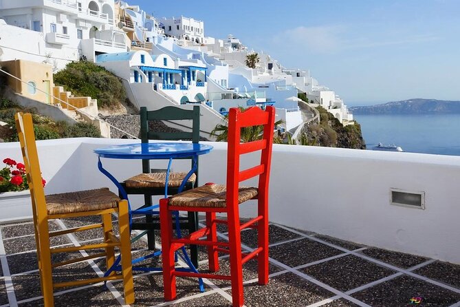 Private Sightseeing Tour with Dinner at Sunset - Perissa Black Sand Beach: a volcanic reset before the winery