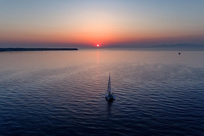 Private Sunset Cruise with Dinner and Drinks! - Santorini Volcano stop: what you’re actually seeing and why it matters