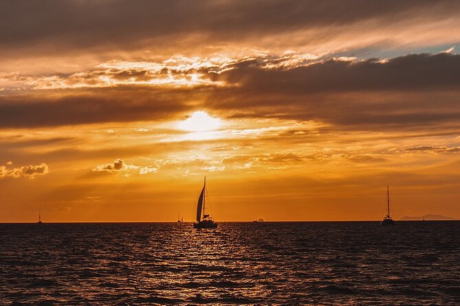 Private Sunset Cruise with Full Greek Dinner - Red Beach, Akrotiri Area, and the Early Caldera Sparkle