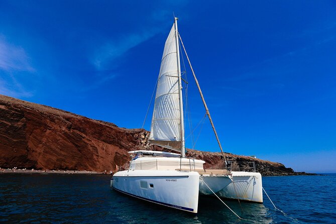 Private Sunset Cruise with Full Greek Dinner - White Beach and the Sea-Only Parts of Santorini