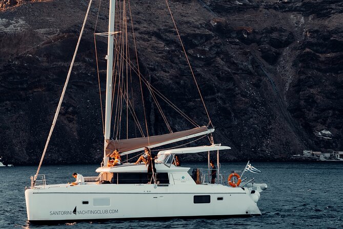 Romantic Sunset Catamaran Caldera Cruise incl. Meal & Drinks - Catamaran cruising in Santorini: what you’re really buying