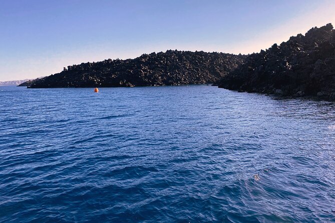 Sailsational Luxury Santorini Catamaran Sunset Cruise with Dinner - Stop 3: Santorini Volcano caldera + sulfur hot springs