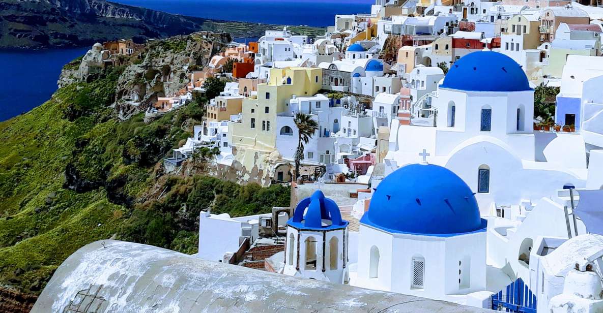 Santorini: 6-Hour Classic Panorama Private Tour - Red Beach cliffs and the lighthouse at the southwest edge