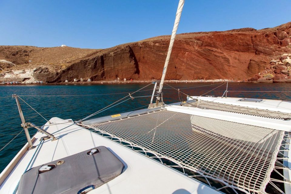 Santorini: 7-Hour Private Catamaran Cruise with Food & Drink - Sunset at Mésa Pigádia: how to make the most of the long golden hour