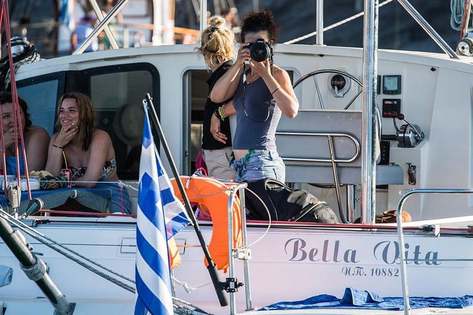 Santorini: Adventurous Catamaran Experience with Snorkeling - Akrotiri Lighthouse at Sea Level: A Serious View Moment