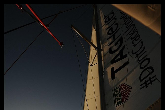 Santorini: Adventurous Catamaran Experience with Snorkeling - Black Mountain Snorkeling: Where the Water Feels Alive
