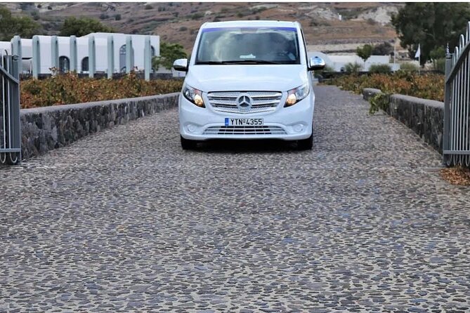 Santorini: Cable Car-Free & Stress-Free Private Island Tour - Perivolos black beach: organized sands, swim time, and a simple lunch option