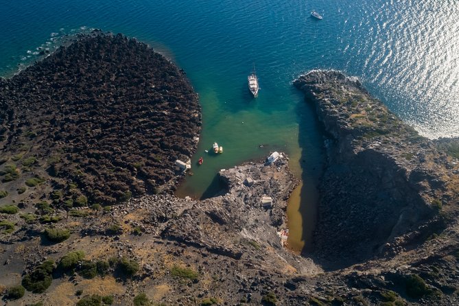 Santorini Caldera Morning Cruise With King Thiras Boat - Thirassia island: Manolas village time and the meaning of “two hours”