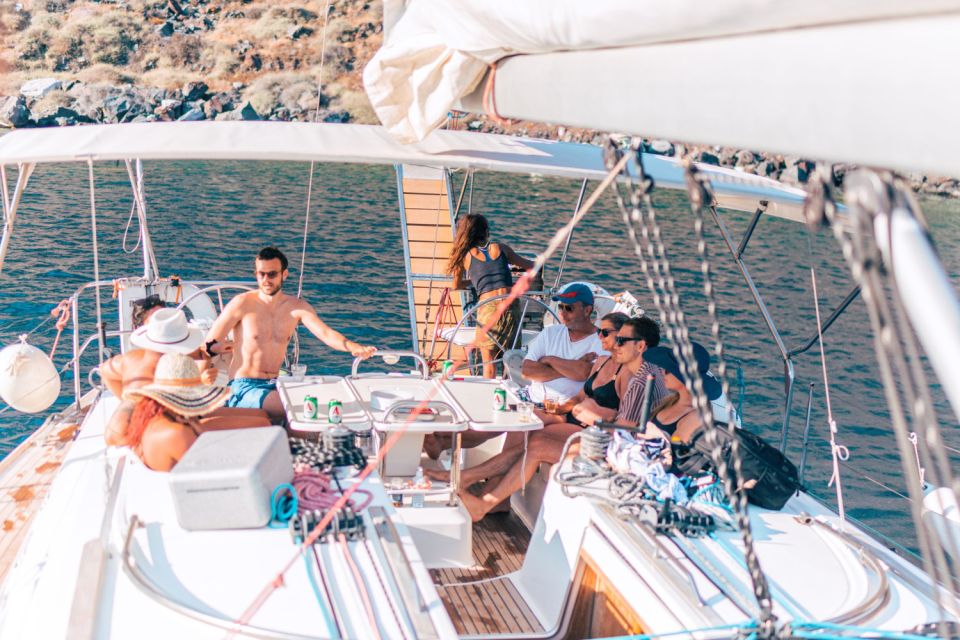 Santorini Caldera: Morning Sailing Cruise with Meal - Entering the caldera: past Akrotiri Lighthouse toward the volcanic islands