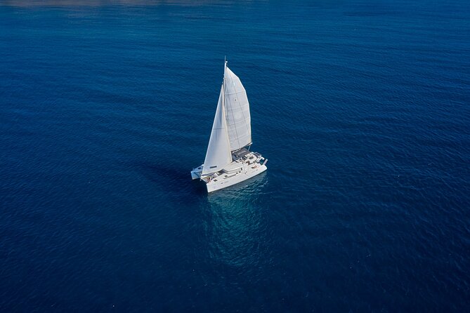 Santorini: Caldera Private Catamaran Cruise with Meal & Drinks - Lunch on board: Greek flavors plus unlimited drinks