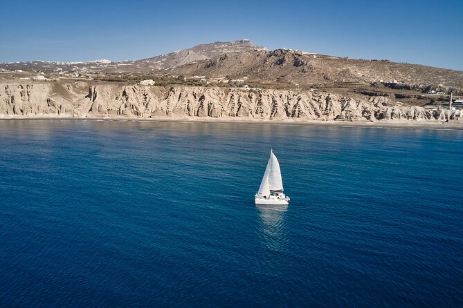 Santorini: Caldera Private Catamaran Cruise with Meal & Drinks - Getting to the catamaran: Vlichada meeting point and Imerovigli pickup