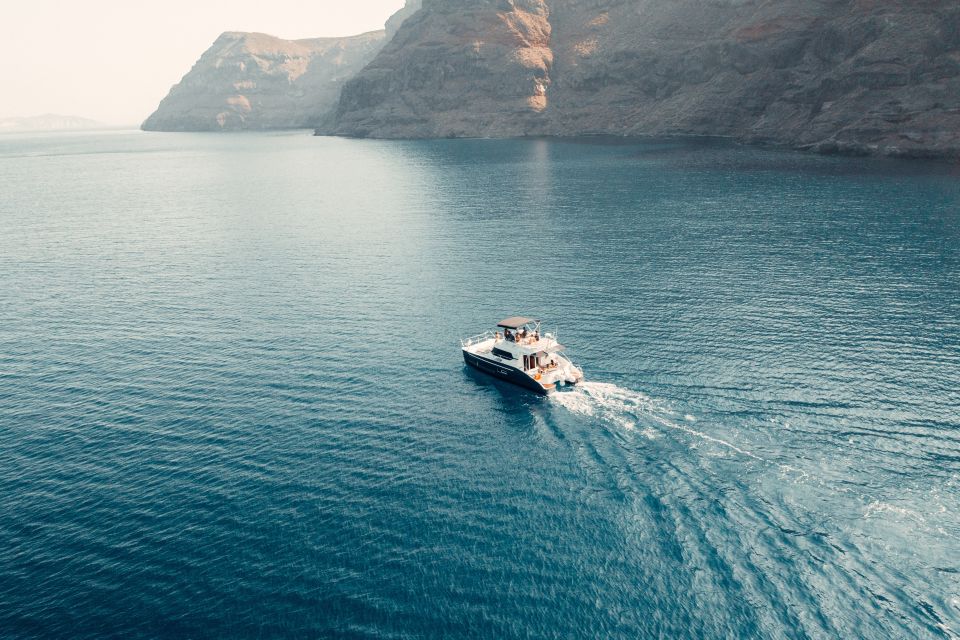 Santorini: Caldera Private Power Catamaran Cruise - White Beach and Red Beach: color, quick swims, and snorkeling time