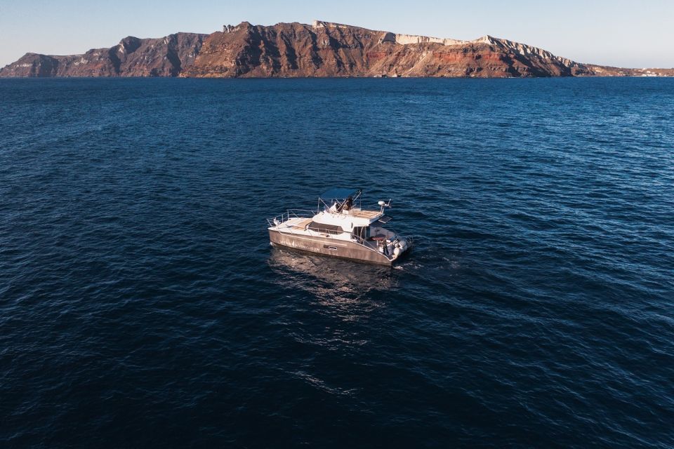 Santorini: Caldera Private Power Catamaran Cruise - Fira BBQ and snacks: where the food becomes part of the cruise
