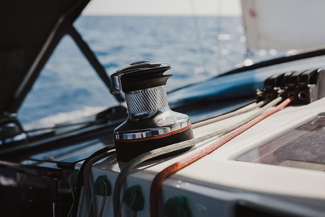 Santorini Caldera Private Sailing Boat Cruise - Akrotiri lighthouse and Mesa Pigadia: sightseeing from the water, not the road