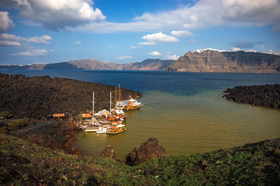 Santorini Caldera: Sunset Cruise with Dinner - Nea Kameni: the active volcano and the bumpy crater trail