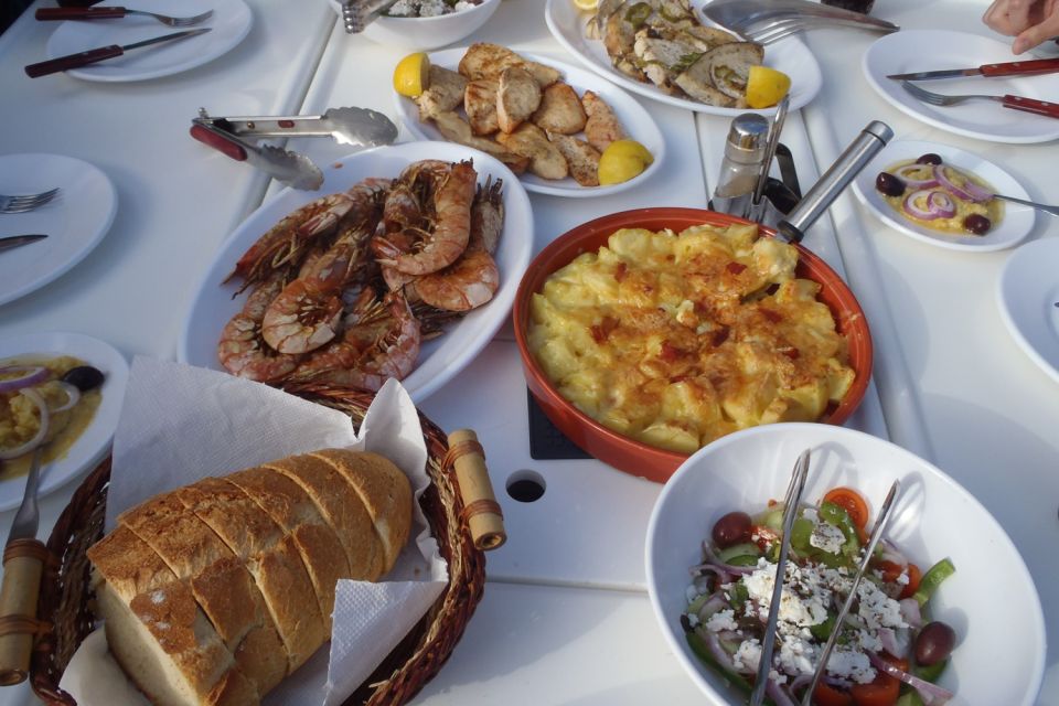Santorini Caldera: Sunset Sailing Cruise with Meal - Mesa Pigadia Beach: swim and snorkel time that feels like a reset