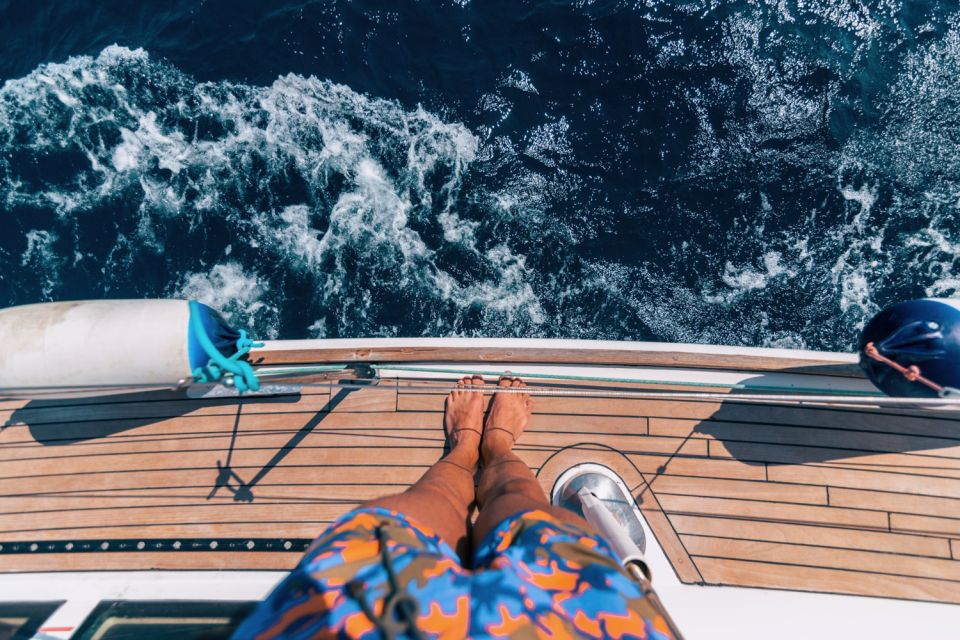 Santorini Caldera: Sunset Sailing Cruise with Meal - Kameni volcanic islands and hot-spring waters: the highlight stop