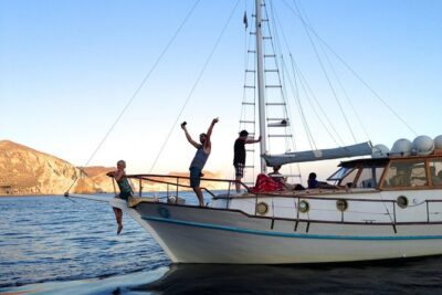 Santorini Caldera Sunset Traditional Cruise with Meal and Drinks - Ammoudi Bay departure: the caldera view starts fast