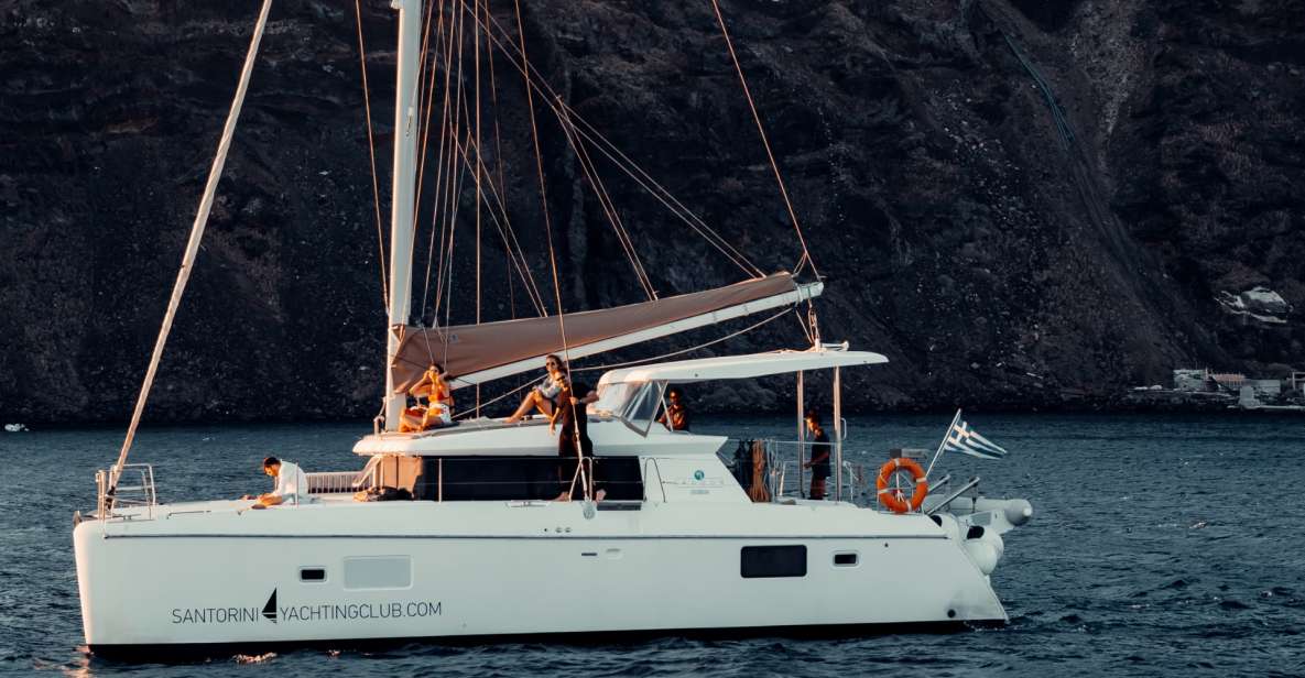 Santorini: Catamaran Caldera Cruise with Meal and Drinks - Mesa Pigadia, White Beach, and Red Beach: The Best Swim Hour