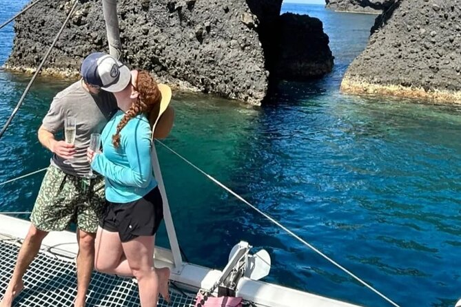 Santorini Catamaran Cruise – 5-Hour Private Sailing Experience - Past the Venetian Lighthouse: Quick Coastline Views