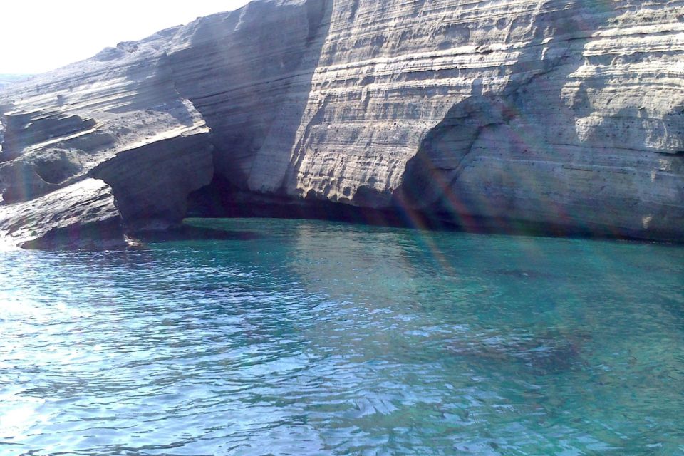 Santorini: Catamaran Cruise, Winery, & Oia Sunset Combo Tour - Volcanic beaches, hot springs area, and snorkeling with provided gear