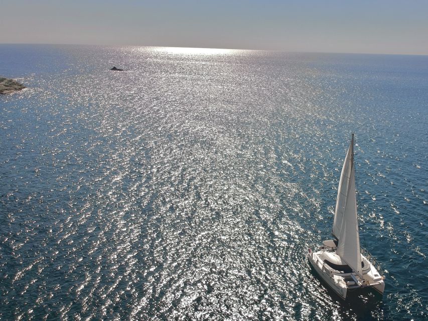 Santorini: Catamaran Cruise with Food and Drinks - Mesa Pigadia: Snorkel Gear, BBQ Buffet, and Drinks